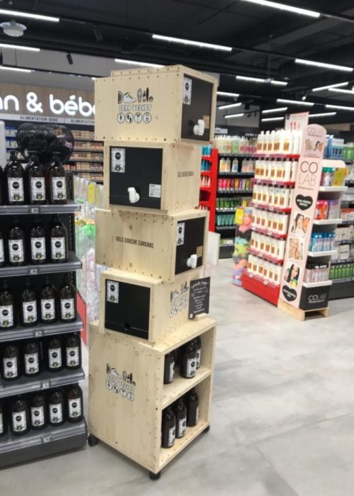 Présentoir bois PLV - distributeur vrac liquide cosmétique pharmacie - Colonne PLV de sol en bois naturel sur mesure