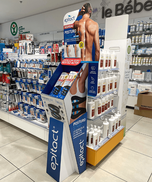 Présentoir silhouette distributeur de produits de soins orthopédiques en pharmacie d'officine